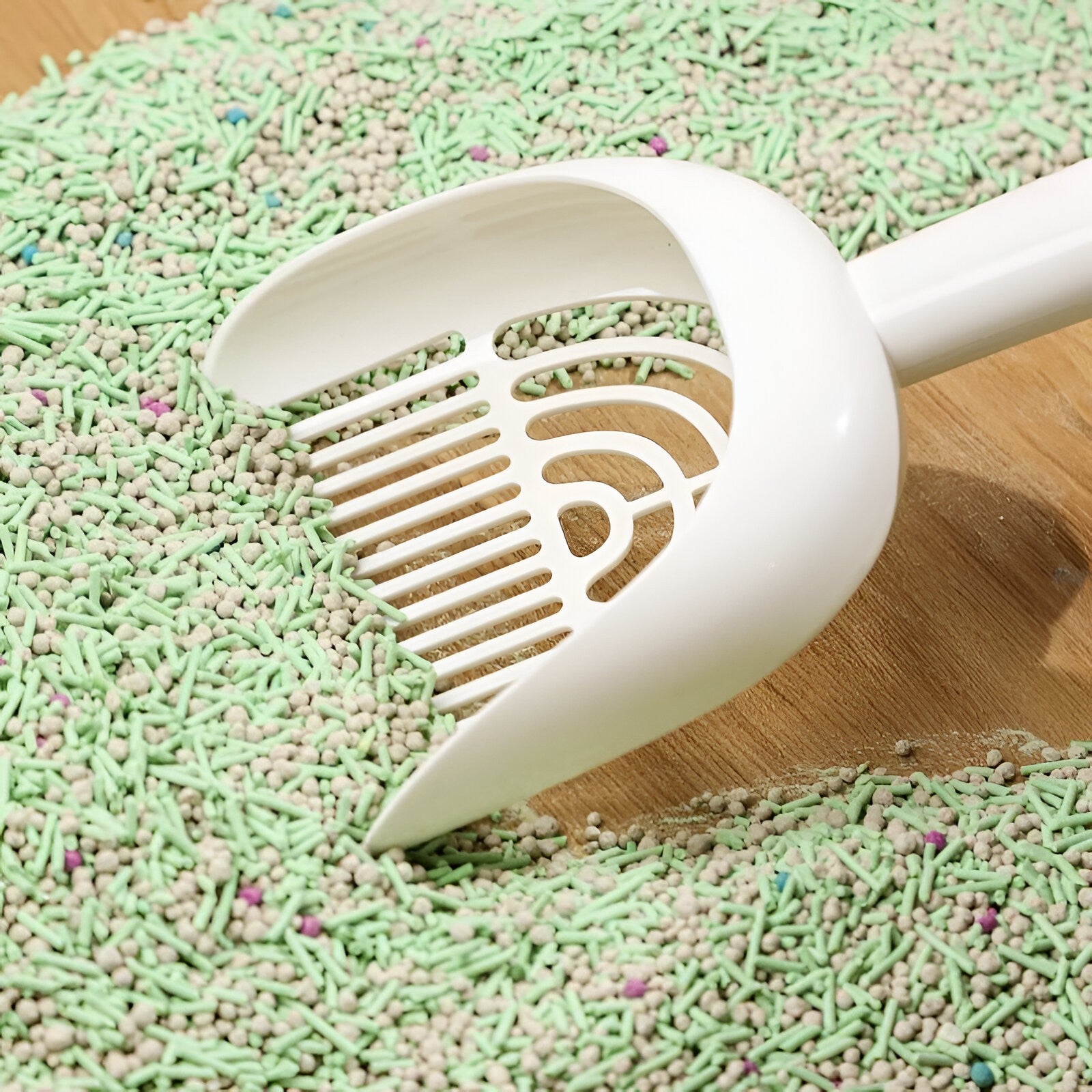 Pelle à litière pour chat avec support mural